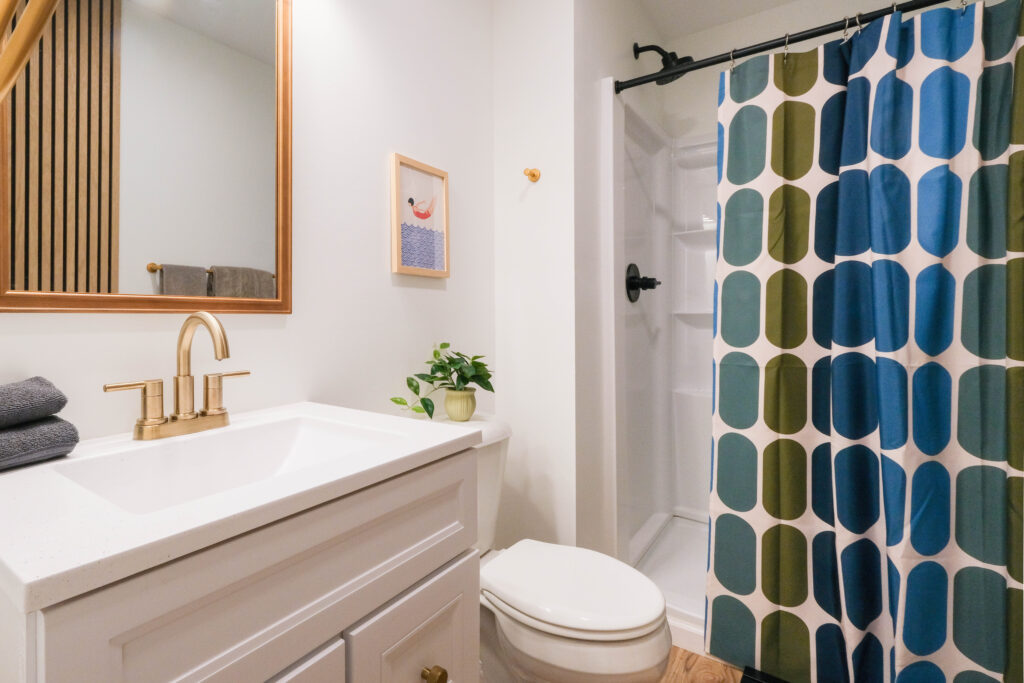 Full bath with shower on main level.