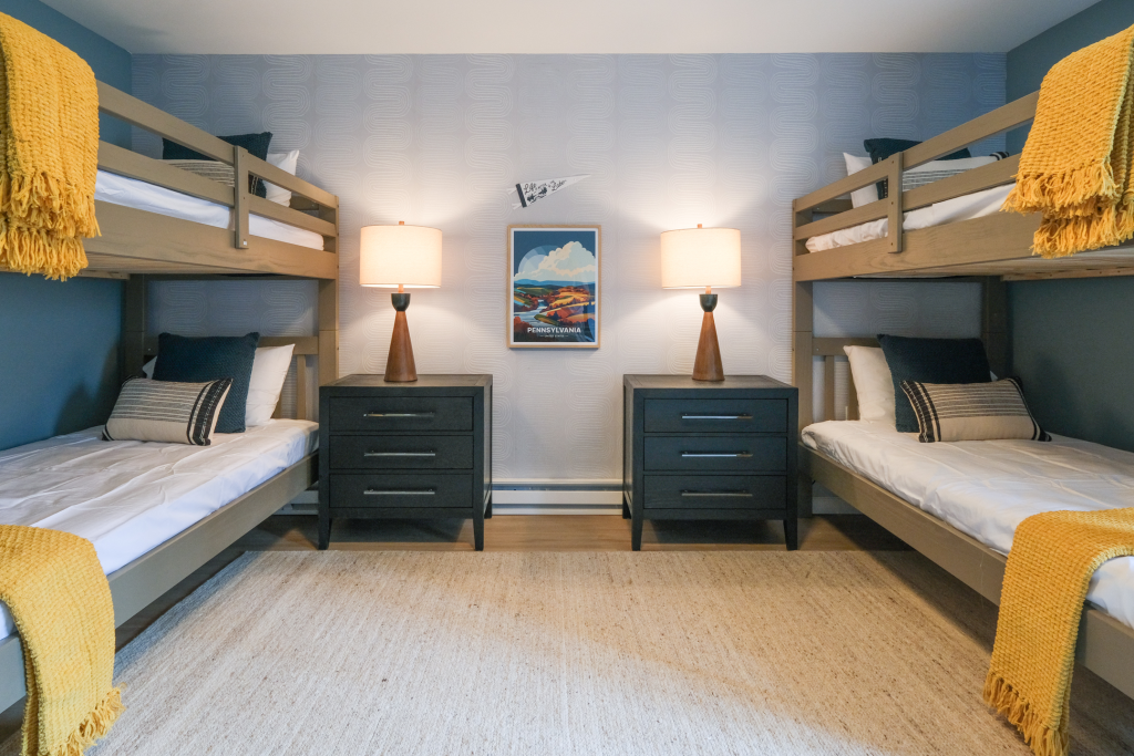 Four bunks in ground level bedroom.